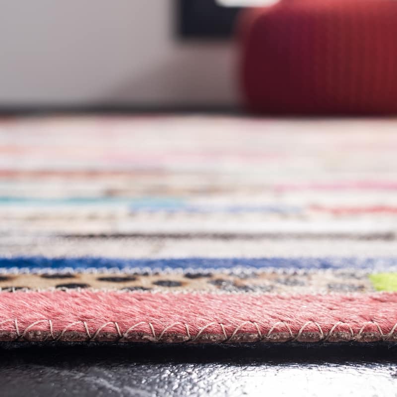 SAFAVIEH Handmade Studio Leather Cherish Natural Hide Leather Rug