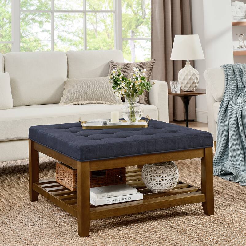 Coffee table with tufted linen upholstery