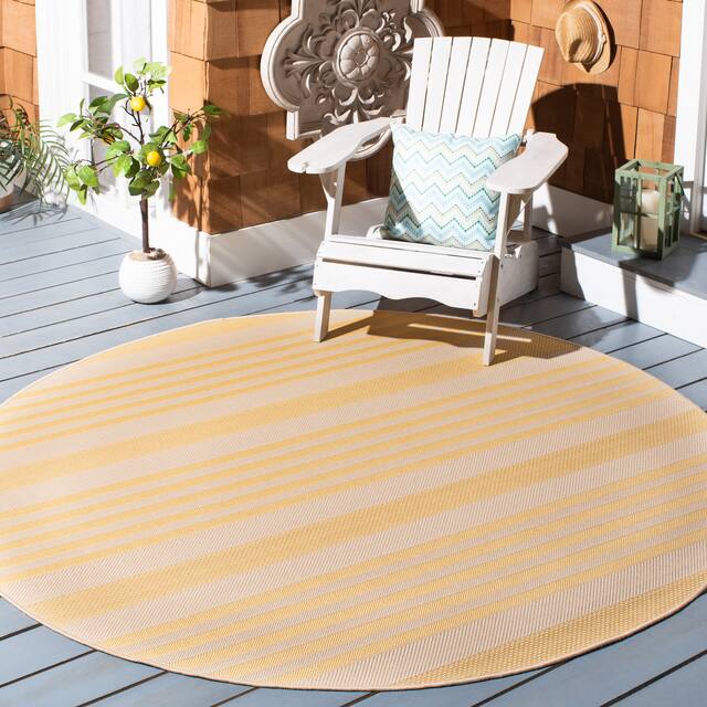 SAFAVIEH Courtyard Charmaine Indoor/ Outdoor Waterproof Area Rug - 6'7" x 6'7" Round - Gold/Beige