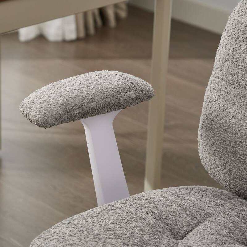 Grey Swivel Chair with Flip-Up Armrests and Crossed Legs