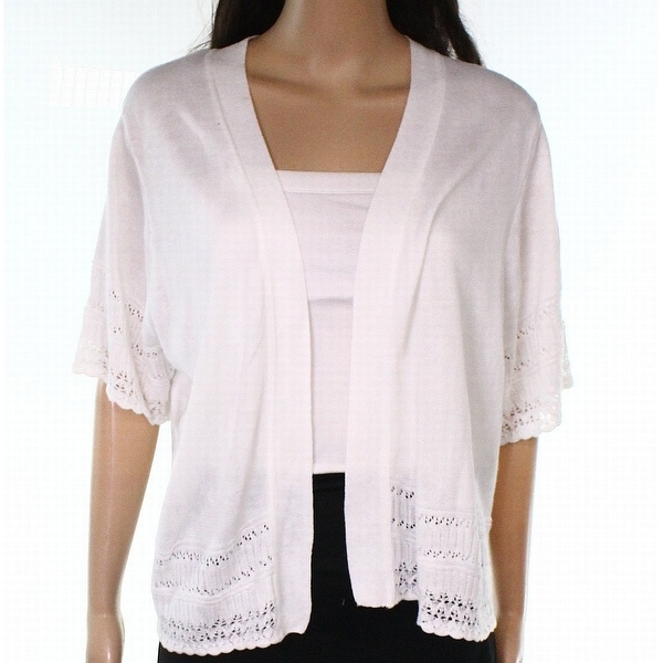 white shrug sweater