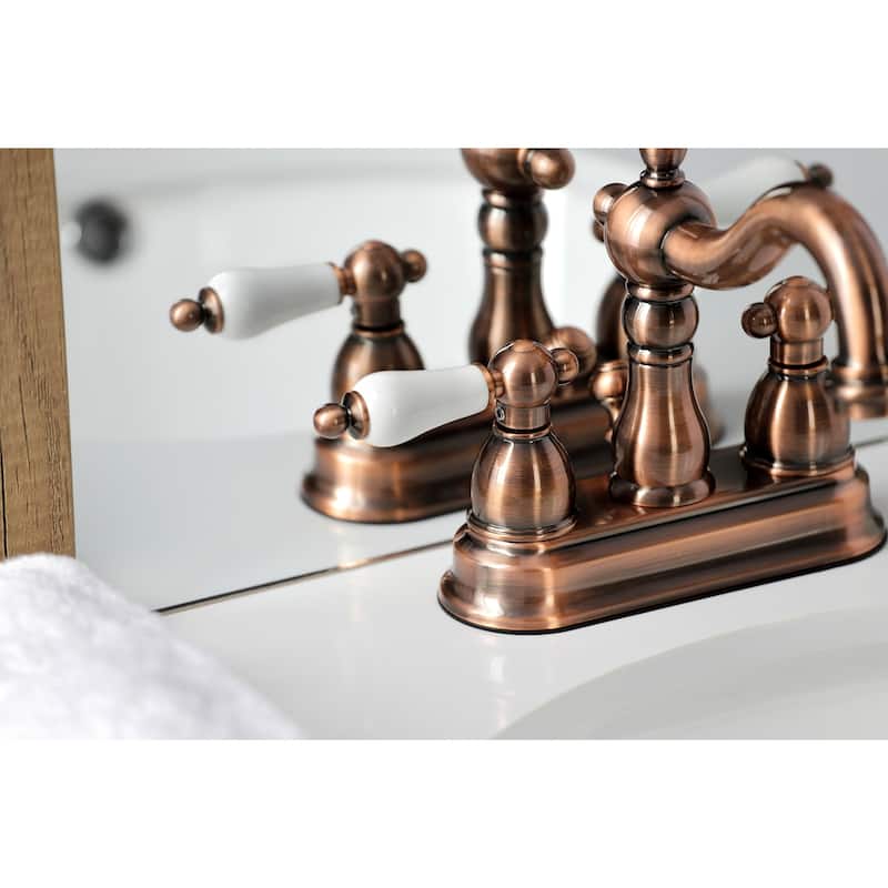Kingston Brass Heritage Two-Handle 3-Hole Deck Mount 4 in. Centerset Bathroom Faucet