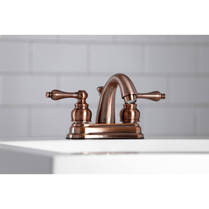 Kingston Brass Restoration Two-Handle 3-Hole Deck Mount 4 in. Centerset Bathroom Faucet