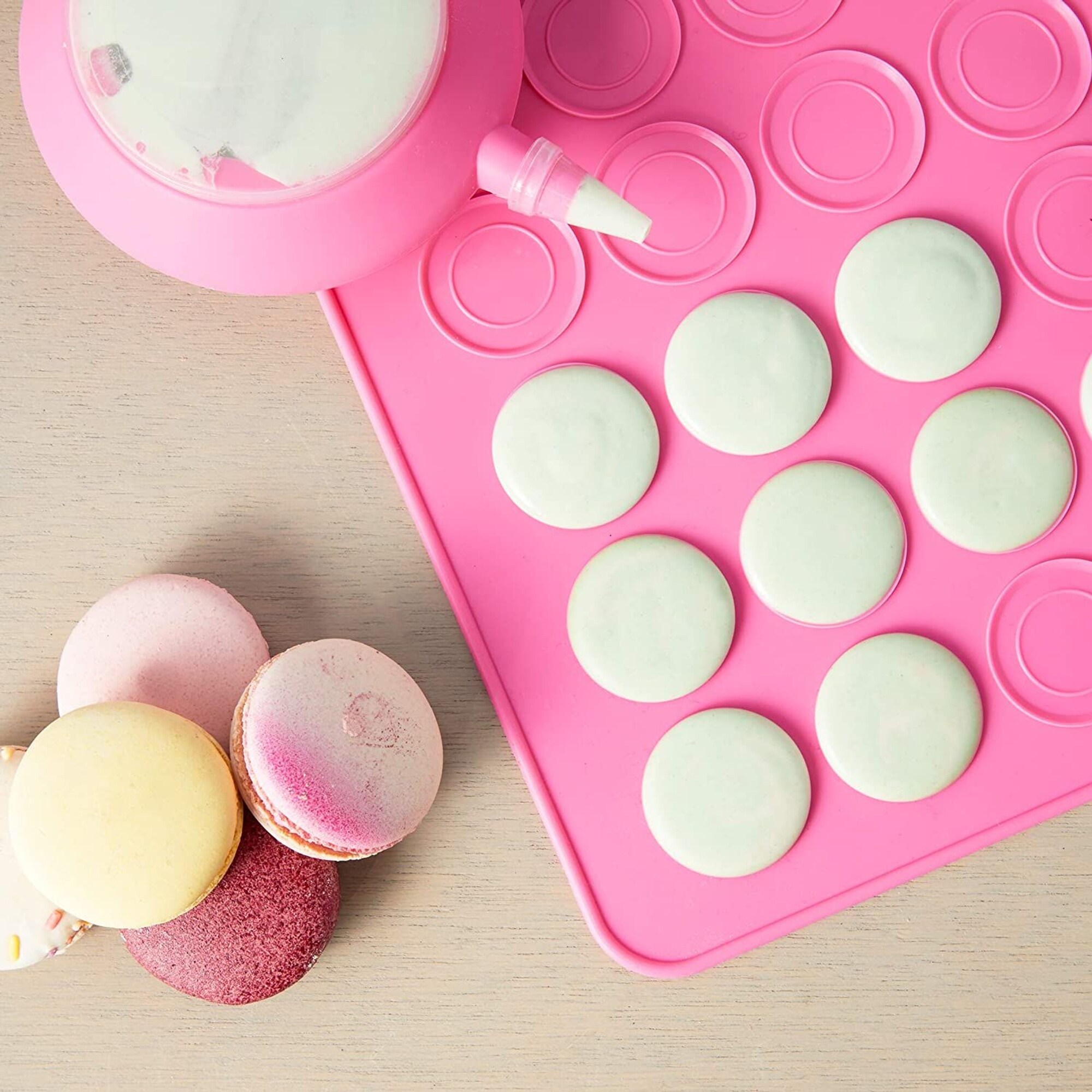 https://ak1.ostkcdn.com/images/products/is/images/direct/21322a79b619dc1aeb751cd8875b68de8181dab8/Macaron-Baking-Kit-with-Pink-Silicone-Mat-Cookie-Sheet%2C-Piping-Pot%2C-5-Nozzle-Tips-%287-Piece-Set%29.jpg