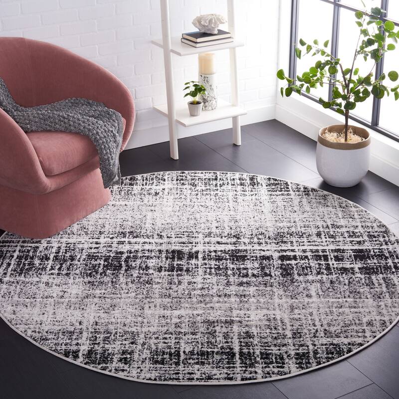 SAFAVIEH Adirondack Anri Modern Distressed Rug - 4' Round - Ivory/Black