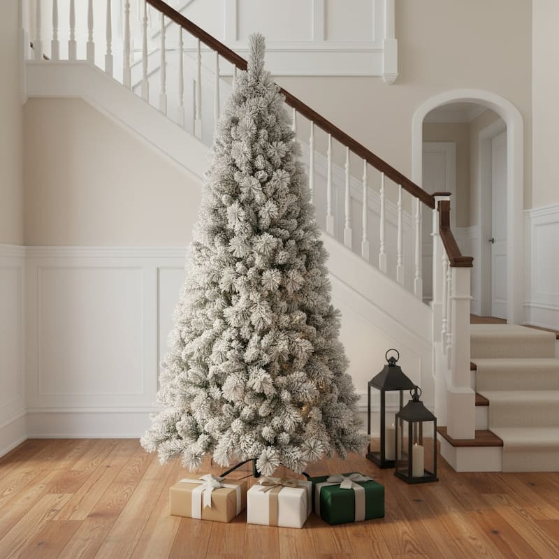HomeRoots 9' Green And White Slender Flocked Pine Christmas Tree - 9 Foot
