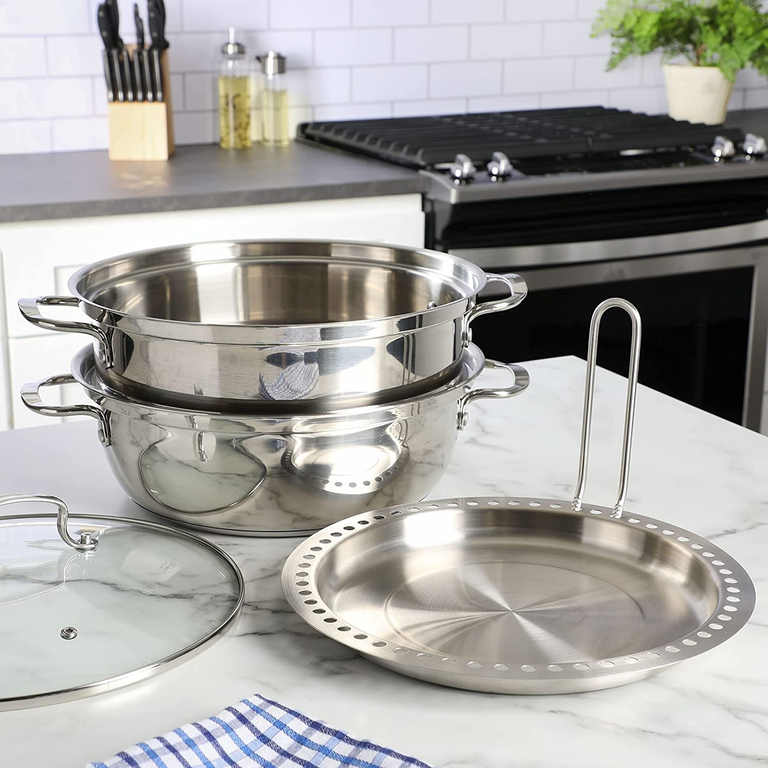 https://ak1.ostkcdn.com/images/products/is/images/direct/21791ec07023dd6dd14a29bff232bfcc26e72161/Kenmore-Elite-Devon-5-Piece-Stainless-Steel-Multi-Steamer-Set.jpg