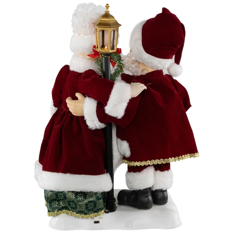 Animated and Musical Mr. and Mrs. Claus Figures with Lighted Lamppost and "Merry Christmas" Sign - 18"