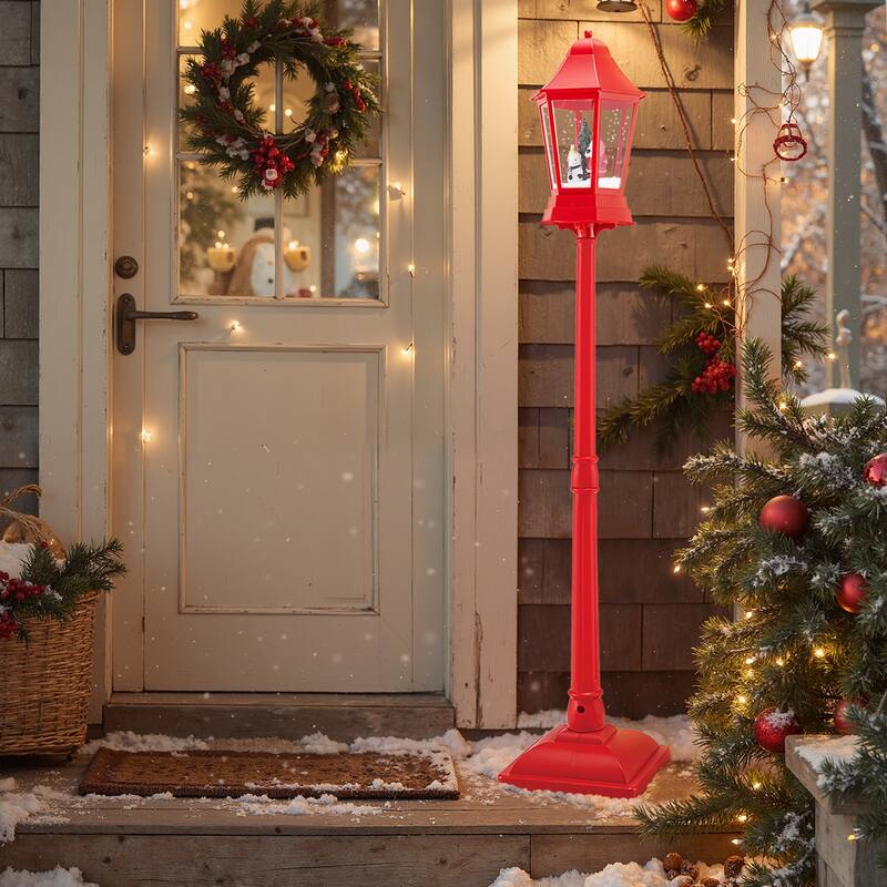 5.3 Feet Red Musical Christmas Street Lamp with LED Lights, Snow Scene, Santa, and 8 Tunes - 12.5" x 12.5" x 64"