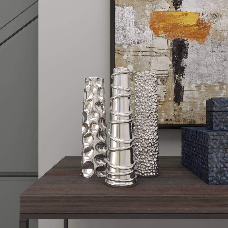 CosmoLiving by Cosmopolitan Sleek Ceramic Glam Vase with Varying Patterns (Set of 3) - Silver, Gold, Dark Blue, White