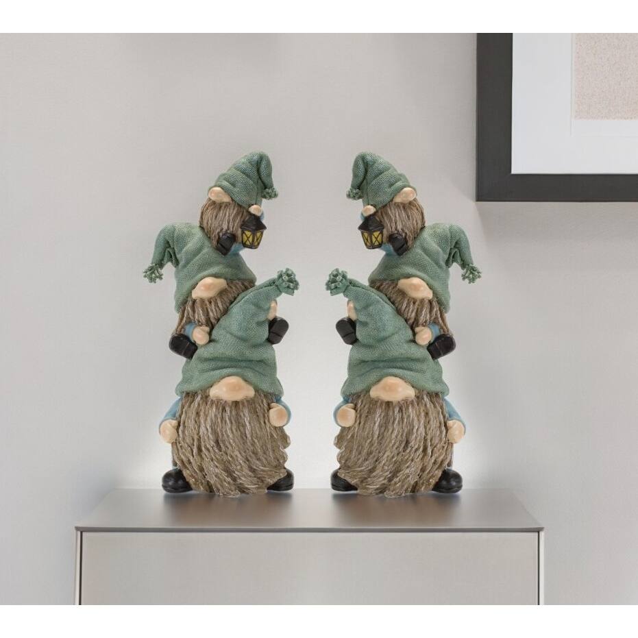 HomeRoots Set of Two 11" Blue and Green Polyresin Christmas Figurine Tabletop Sculpture - 4.25' X '11' X '5.25