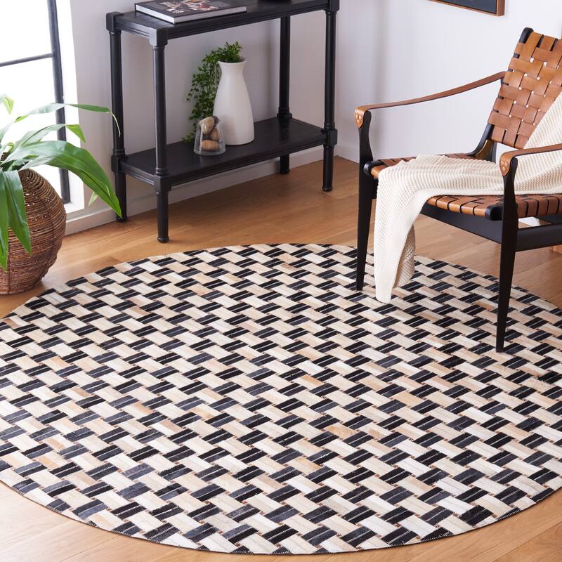 SAFAVIEH Handmade Studio Leather Shawanda Mid-Century Modern Rug - 6' Round - Black/Ivory