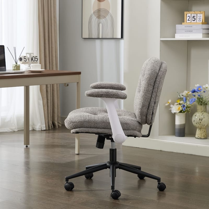 Grey Swivel Chair with Flip-Up Armrests and Crossed Legs