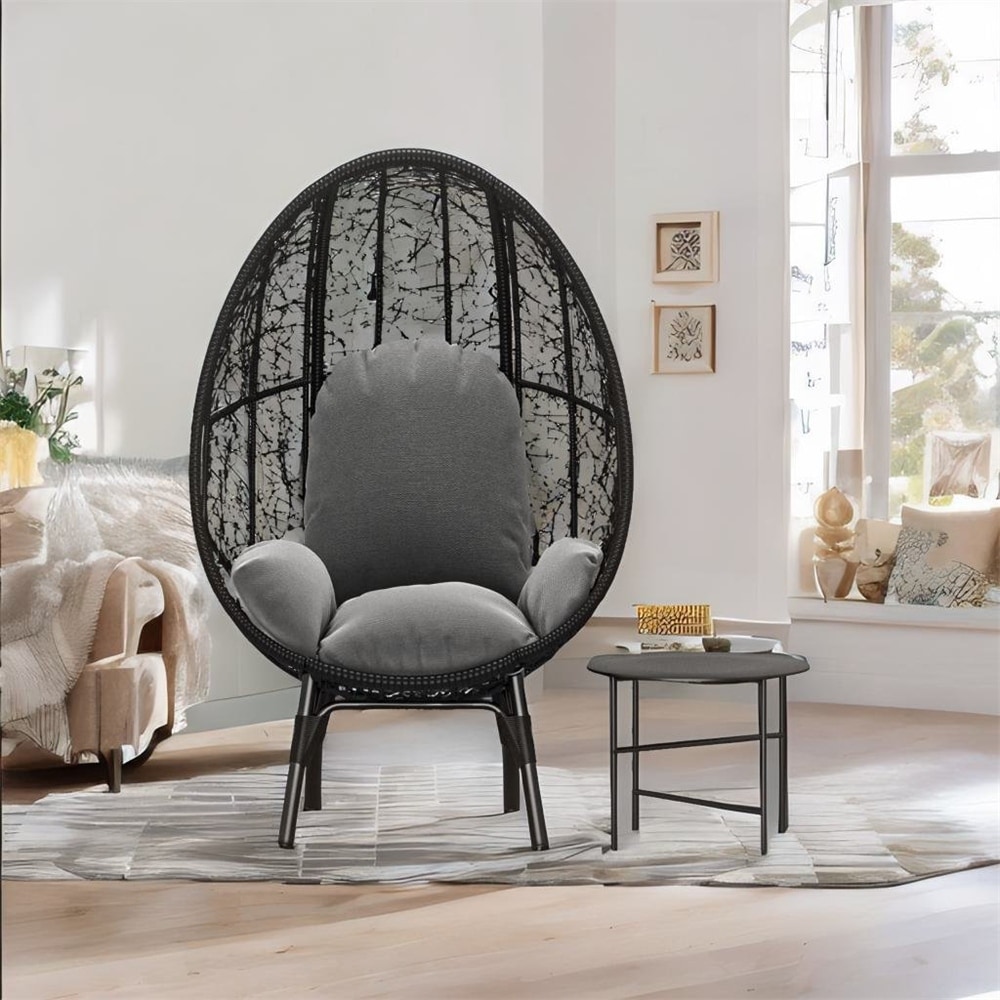 https://ak1.ostkcdn.com/images/products/is/images/direct/21c788be4c76fb052d179e5e567dd2096fde6f3c/Rattan-Egg-Chair-with-Same-Color-Cushion-and-Black-Side-Table.jpg