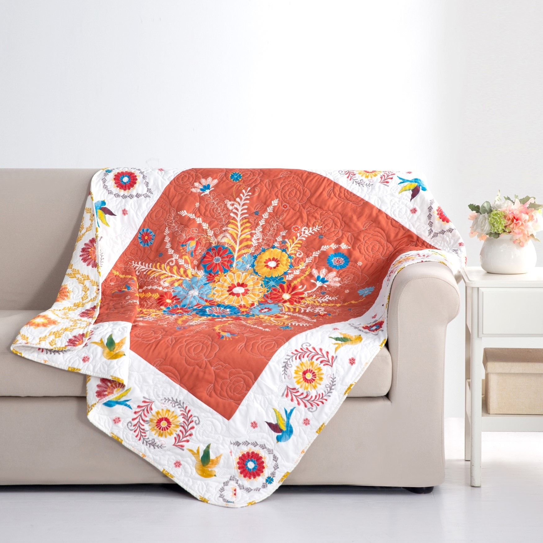Floral sales quilted throw