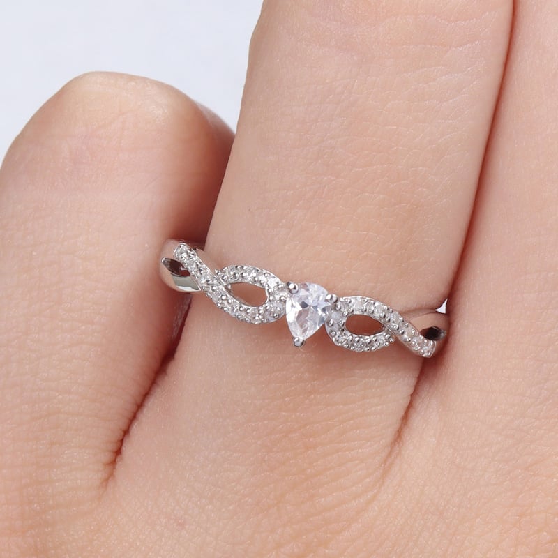 Miadora 1/10ct TDW Diamond and Created White Sapphire Infinity Engagement Ring in Sterling Silver