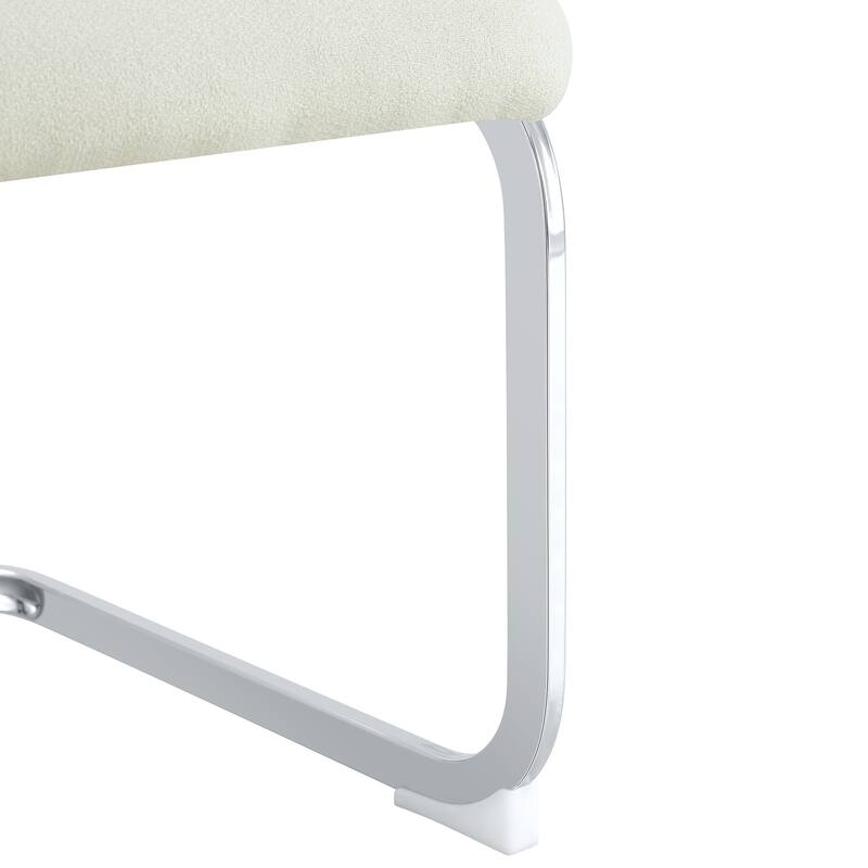 Set of 4 Dining Chairs. Comfort & Stability in One.The combination of grainy fabric-like fabric and silver metal legs