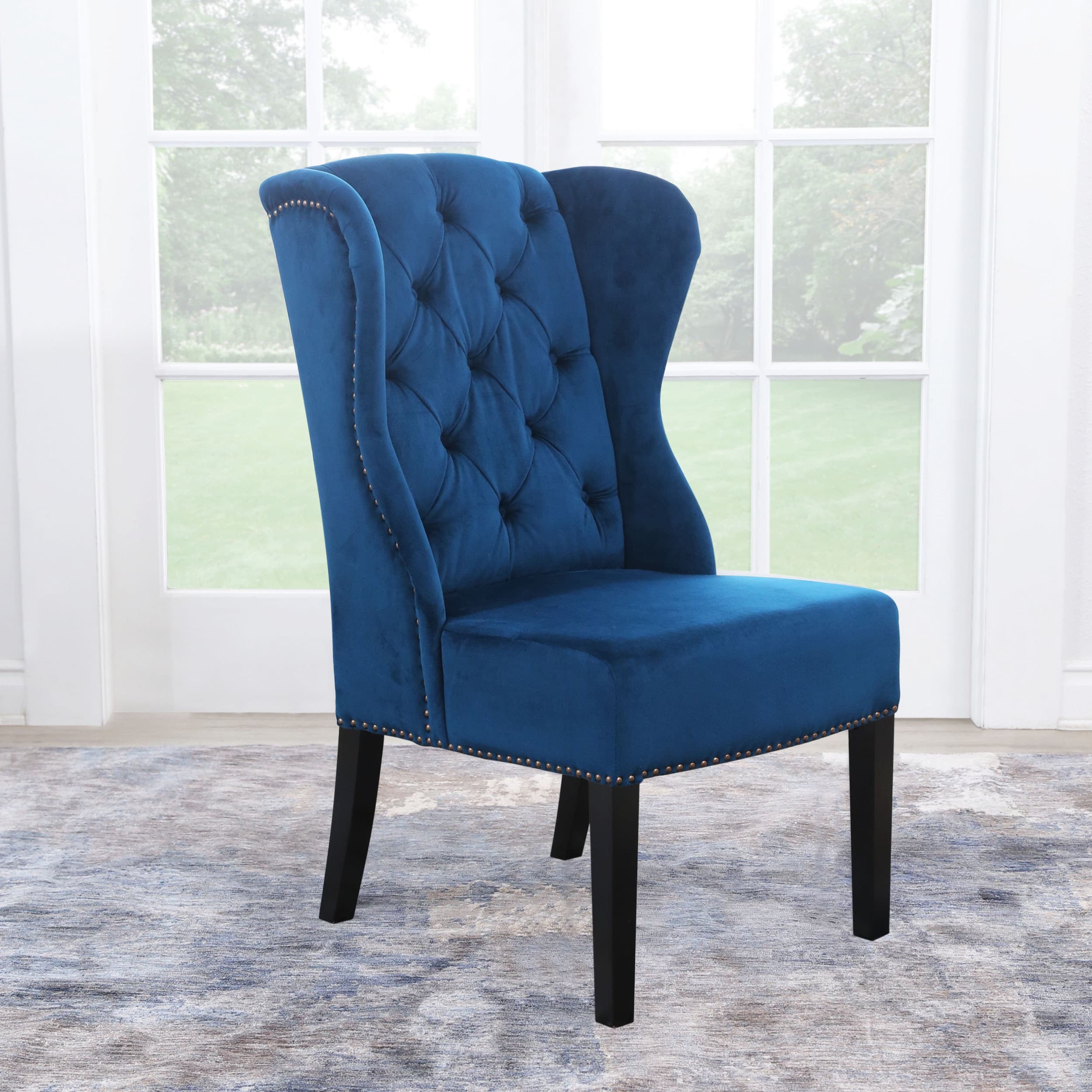 Abbyson Sierra Tufted Navy Blue Velvet Wingback Dining Chair Overstock 10990684 Choose from navy blue, gray, or a natural linen hue to create a clean and crisp setting for your dining experience.