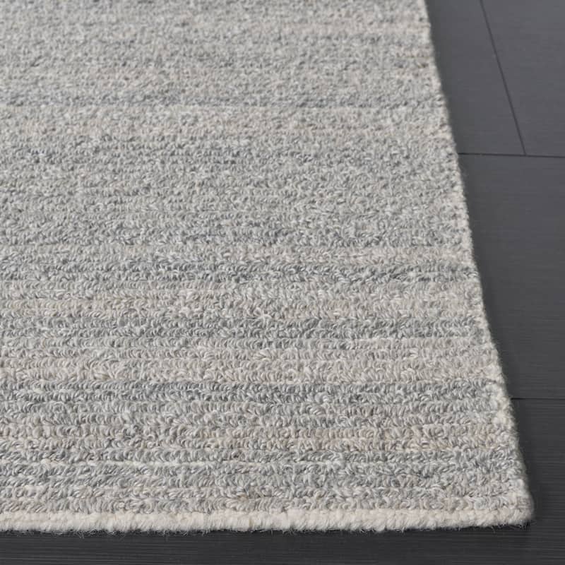 SAFAVIEH Handmade Ebony Cesarina Modern Wool Rug