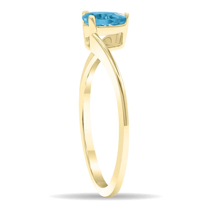 Women's Solitaire Pear Shaped Blue Topaz Wave Ring in 10K Yellow Gold