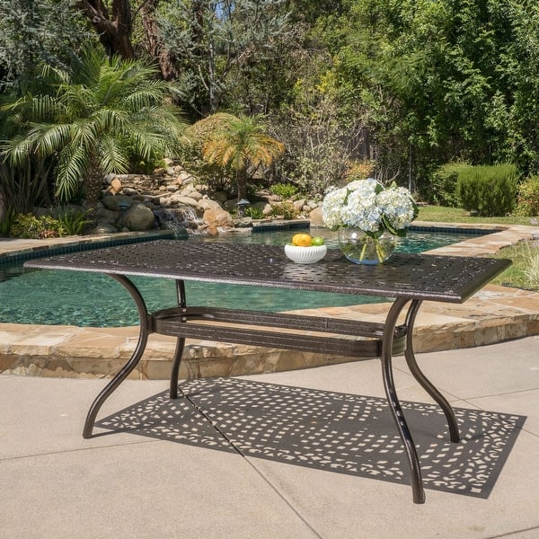 slide 3 of 8, Hallandale Bronze Aluminum Outdoor Dining Table by Christopher Knight Home - 67.00" L x 37.50" W x 30.25" H Bronze
