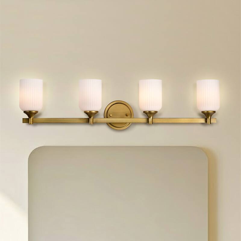 Solara 4 Light Vanity Natural Brass Finish Frosted Ribbed Glass - Natural Brass