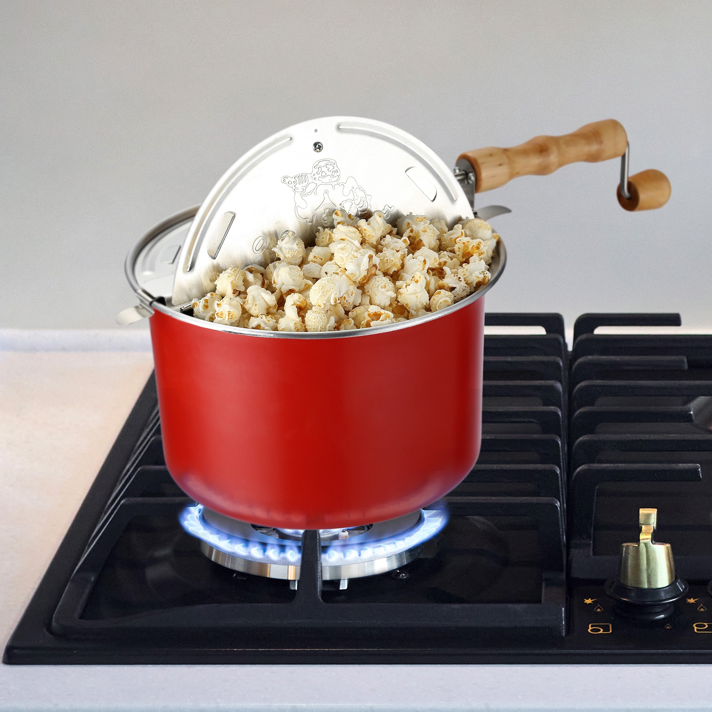 https://ak1.ostkcdn.com/images/products/is/images/direct/2279342b414f02a206ab8afa7e489efd281fcc9f/6.5-Quart-Stovetop-Popcorn-Maker-by-Great-Northern-Popcorn-%28Red%29.jpg