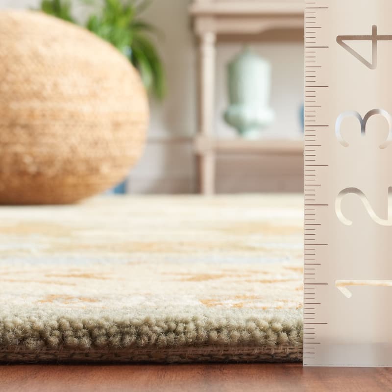 SAFAVIEH Handmade Heritage Stelia Traditional Wool Rug
