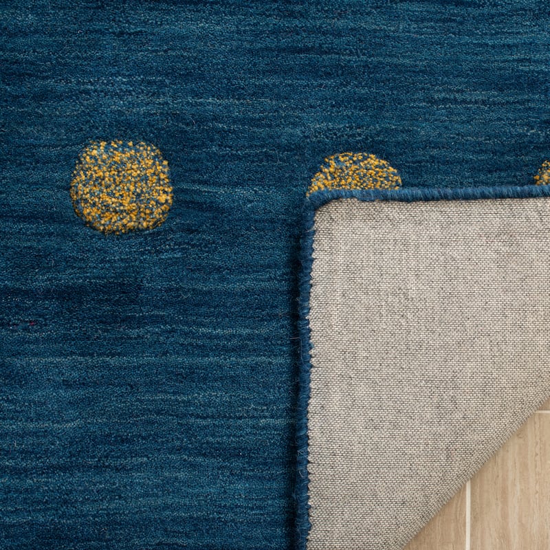 SAFAVIEH Handmade Himalaya Brittni Modern Wool Rug