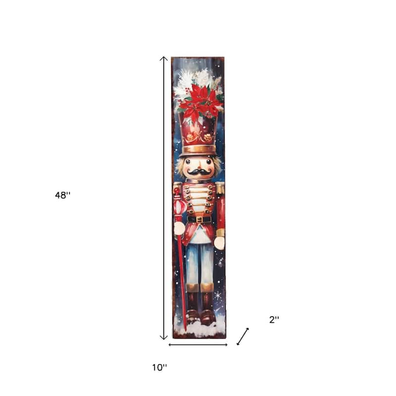 HomeRoots 48" Blue White And Red Christmas Nutcracker Solid Wood Porch Sign