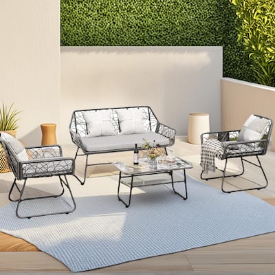 4-Piece Outdoor Rattan Sofa Set with Glass Table & Waterproof Cushions