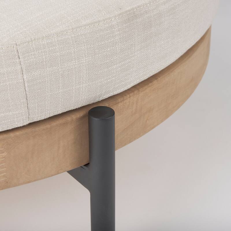 Colburne Cream Fabric with Light Brown Solid Wood Trim and Black Metal Legs Round Ottoman