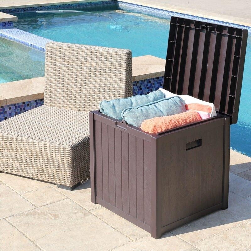 https://ak1.ostkcdn.com/images/products/is/images/direct/233769ed0844db55fabe22cb01ea82c32877a529/Zenova-52-Gallon-Small-Deck-Box-Outdoor-Storage-Container-and-Seat-for-Patio-Cushions-and-Gardening-Tools.jpg