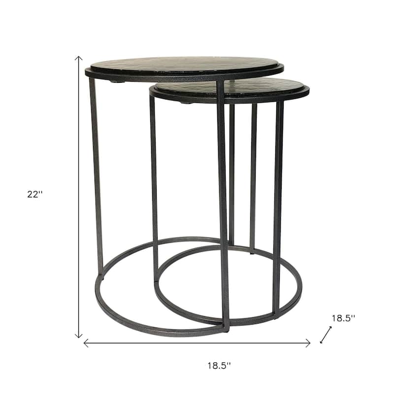 HomeRoots Set of Two Clear and Gunmetal Glass and Iron Round Frame Nested Tables - 18.5 in. x 22 in. x 18.5 in.
