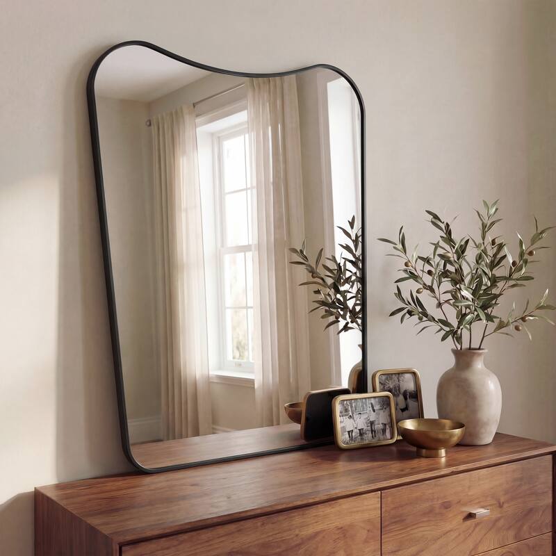 JONATHAN Y Alfie Irregular Metal Framed Wall Mounted Mirror with Flat Bottom