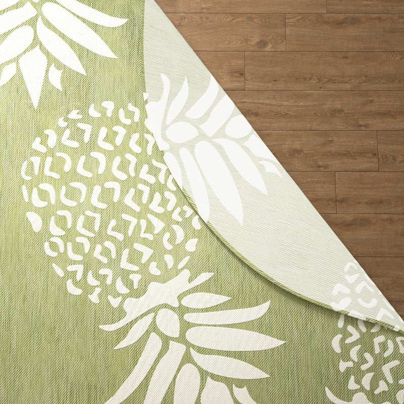 Isola Tropical Indoor/Outdoor Area Rug by Porch & Den