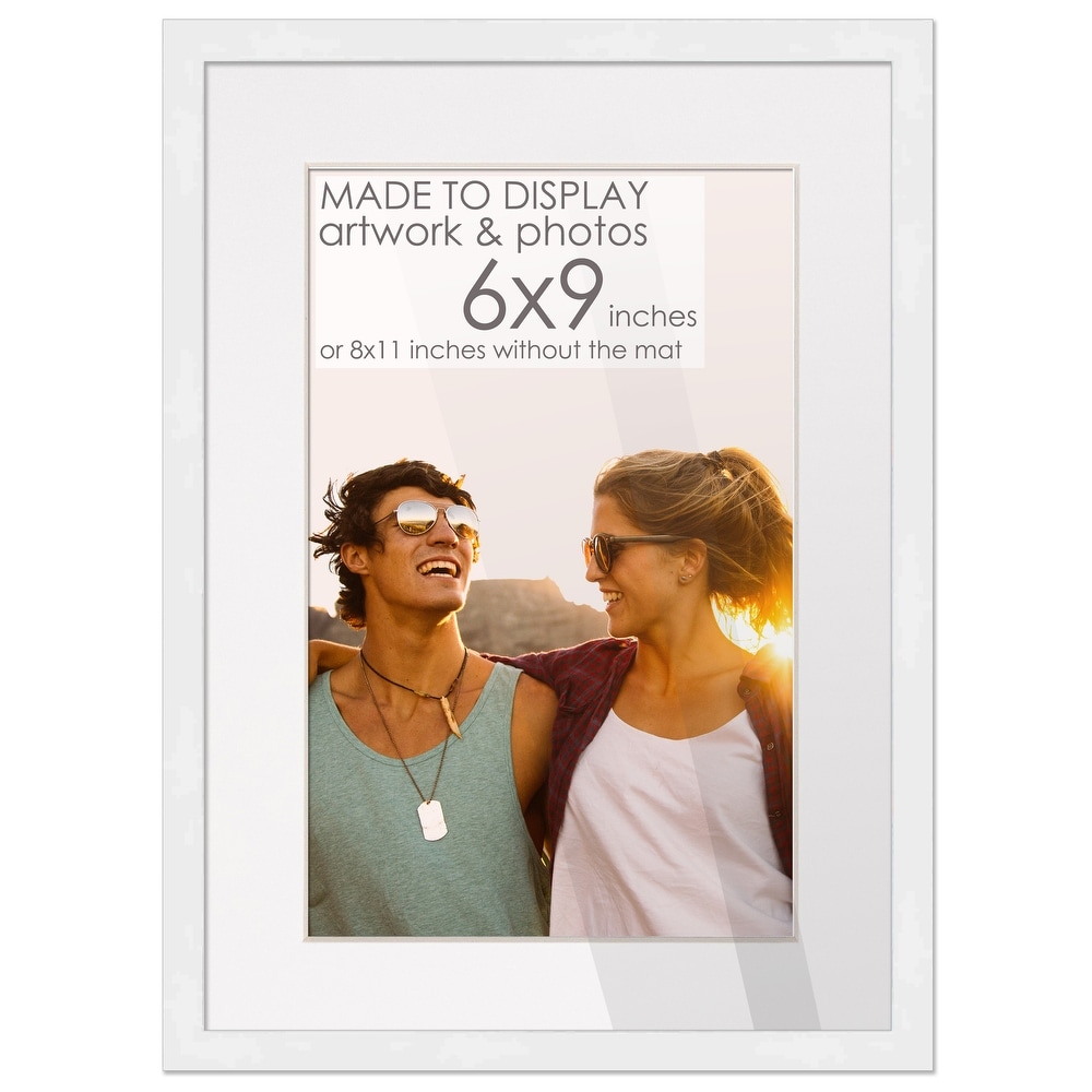 https://ak1.ostkcdn.com/images/products/is/images/direct/2375ce77c42e1bd997bd97c5869d52ba597b1541/8x11-White-Picture-Frame-with-5.5x8.5-White-Mat-Opening-for-6x9-Image%2C.jpg