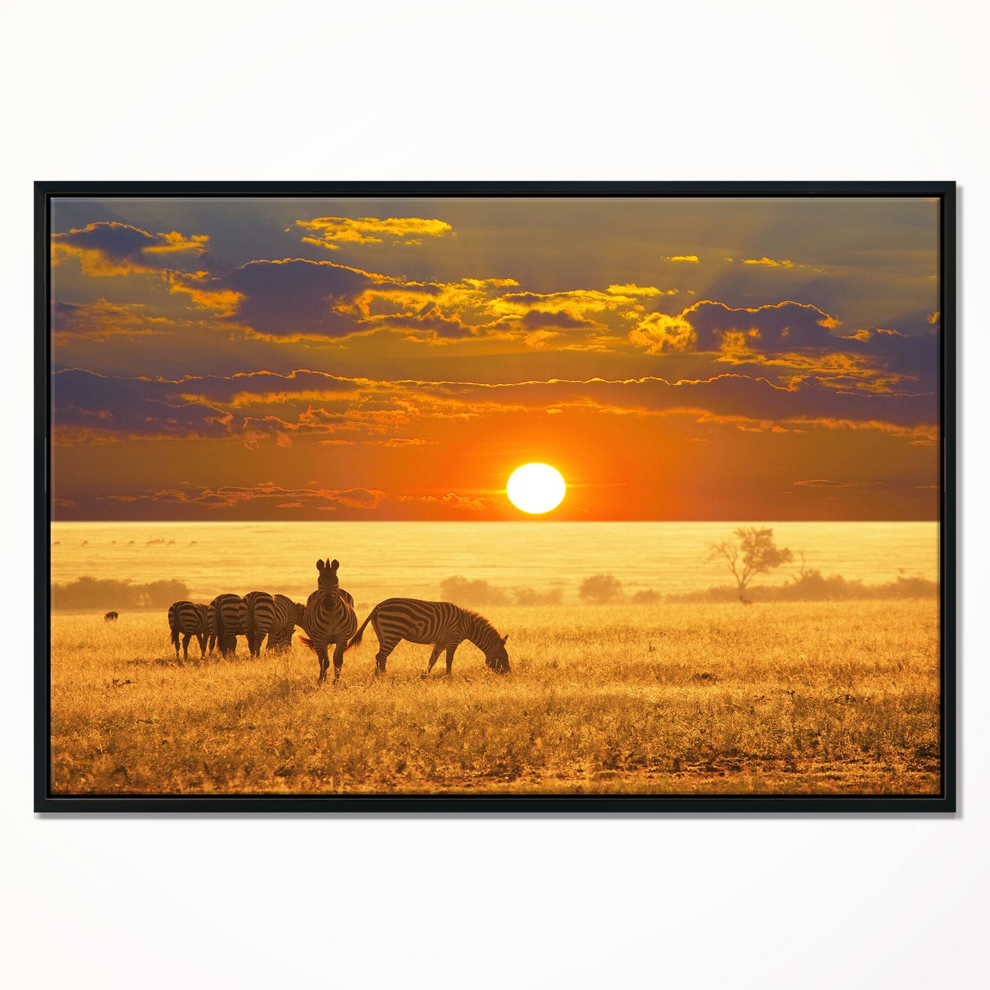 Designart "Group of Zebras Grazing At Sunset" Animal Framed Canvas Art