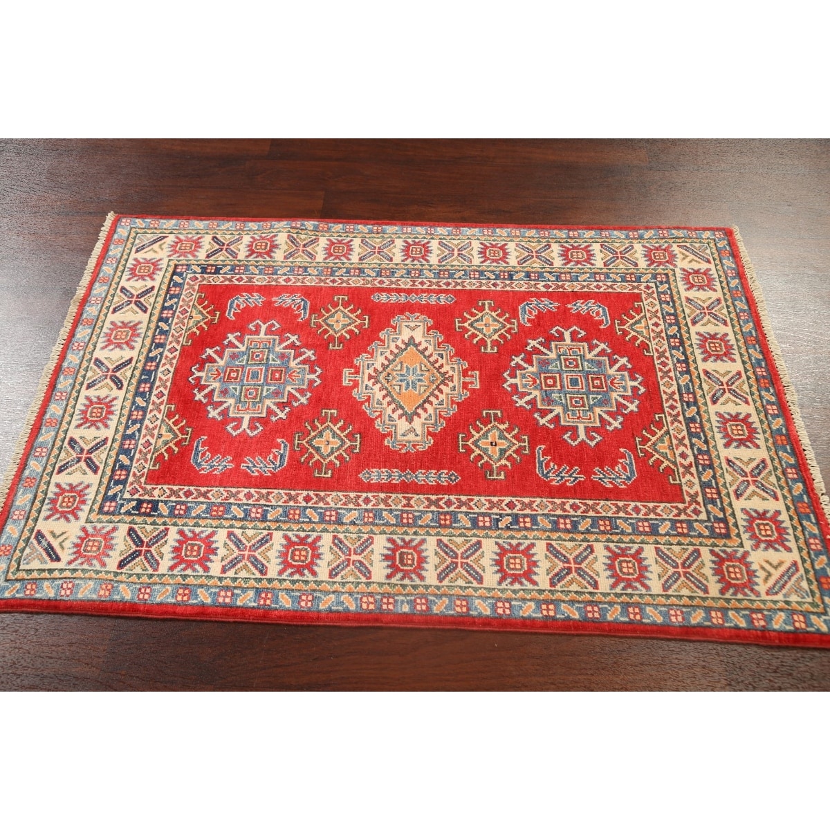 https://ak1.ostkcdn.com/images/products/is/images/direct/238ba9fcc60952522bcaae73de093315d0596104/Kazak-Traditional-Oriental-Area-Rug-Wool-Hand-knotted-Geometric-Carpet.jpg