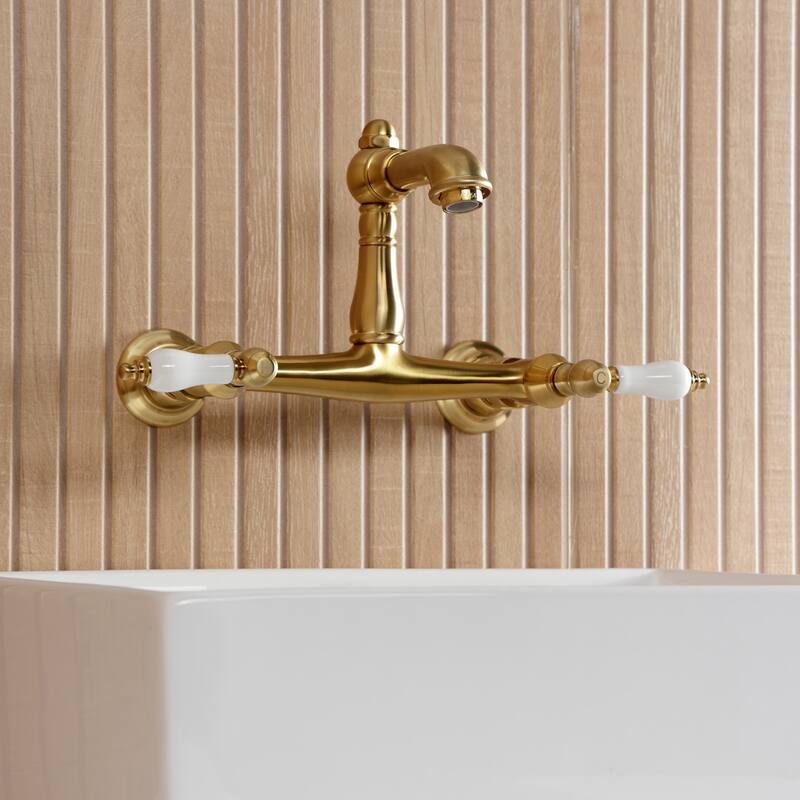 Kingston Brass English Country Two-Handle 2-Hole Wall Mount Bathroom Faucet