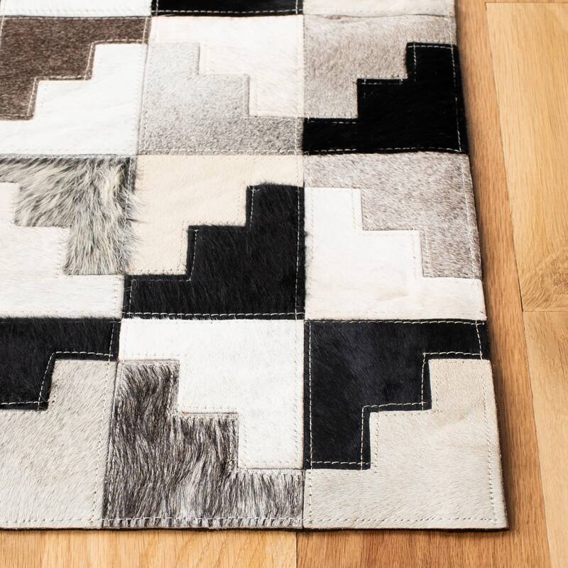 SAFAVIEH Handmade Studio Leather Rengin Modern Leather Rug