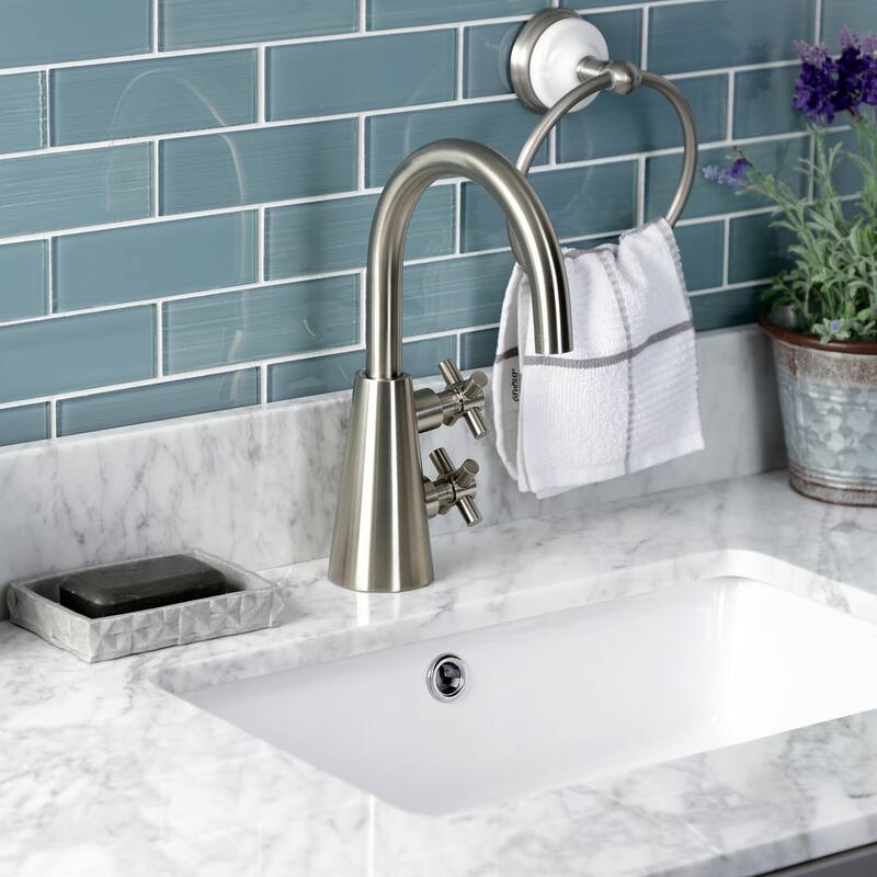 Kingston Brass Constantine Two-Handle 1-Hole Deck Mount Bathroom Faucet with Push Pop-Up