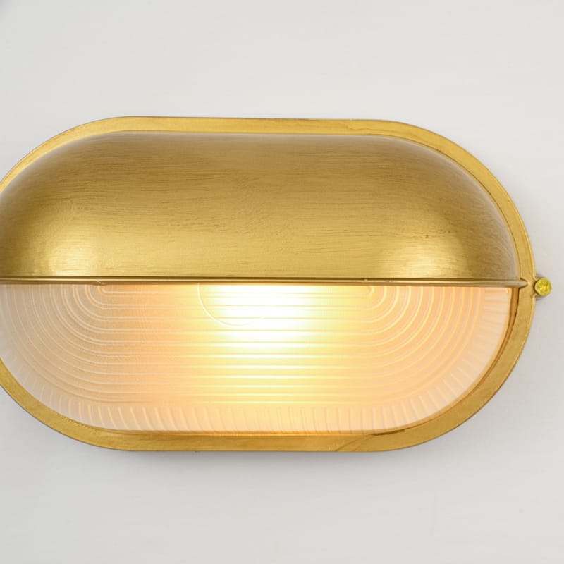 11"W 1-Light Retro 40W Oval Painted Gold Finish Wall Sconce with Clear Rippled Glass - 11.0 in. W x 6.3 in. H x 4.7 in. D