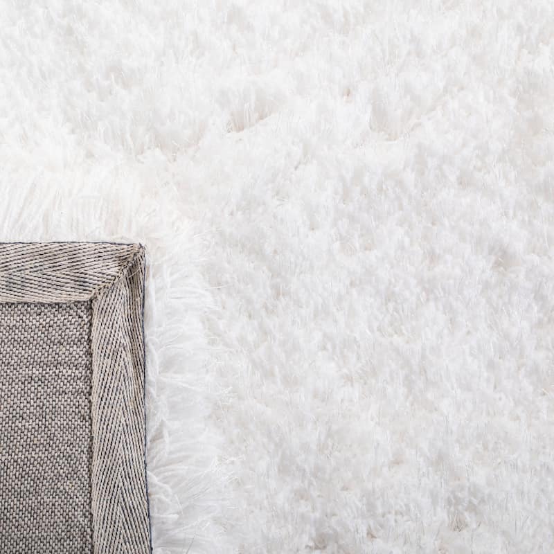 SAFAVIEH Handmade Brandy Shag Raila Glam Rug