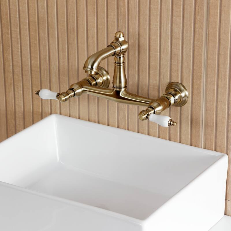 Kingston Brass English Country Two-Handle 2-Hole Wall Mount Bathroom Faucet