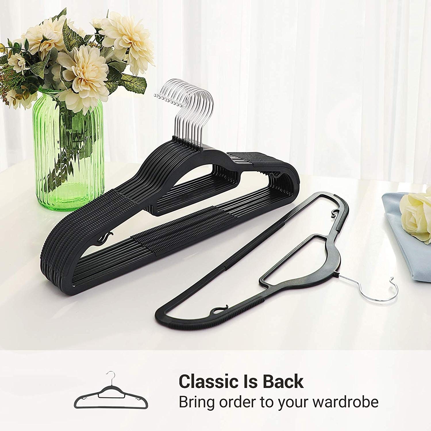 https://ak1.ostkcdn.com/images/products/is/images/direct/243128fc1151d608f5a5e168952db11bc94029ab/Pack-of-50-Coat-Hangers%2C-Heavy-Duty-Plastic-Hangers-with-Non-Slip-Design%2C-Space-Saving-Clothes-Hangers%2C-0.2-Inch-Thickness.jpg