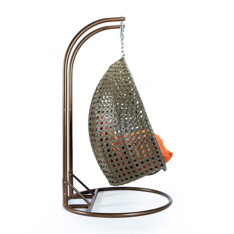 LeisureMod 2-Person Hanging Egg Swing Chair with Metal Stand - Handcrafted Beige Wicker, Patio Hammock Lounger with Cushions