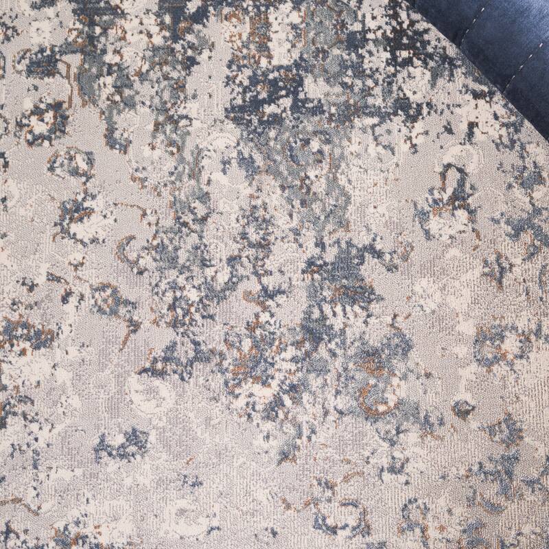 SAFAVIEH Noble Kyouko Viscose Slip Resistant Rug - 5'1" x 7'6"