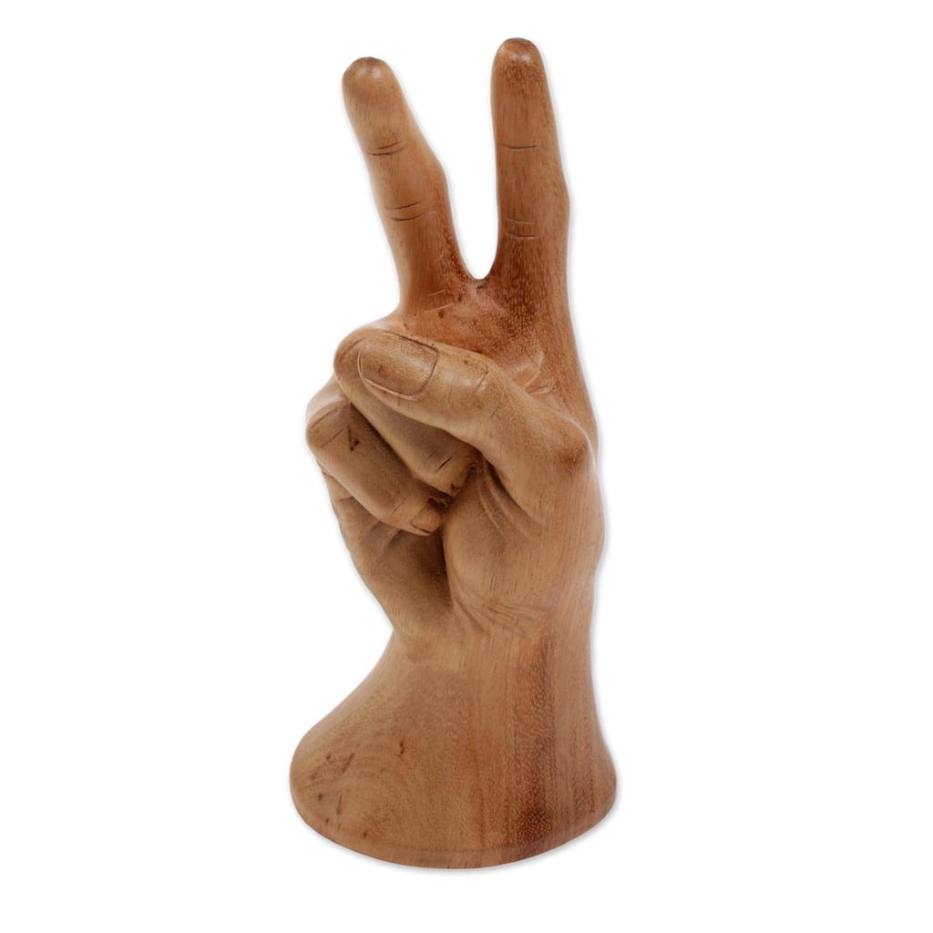 Wood sculpture, 'Peace, Man'