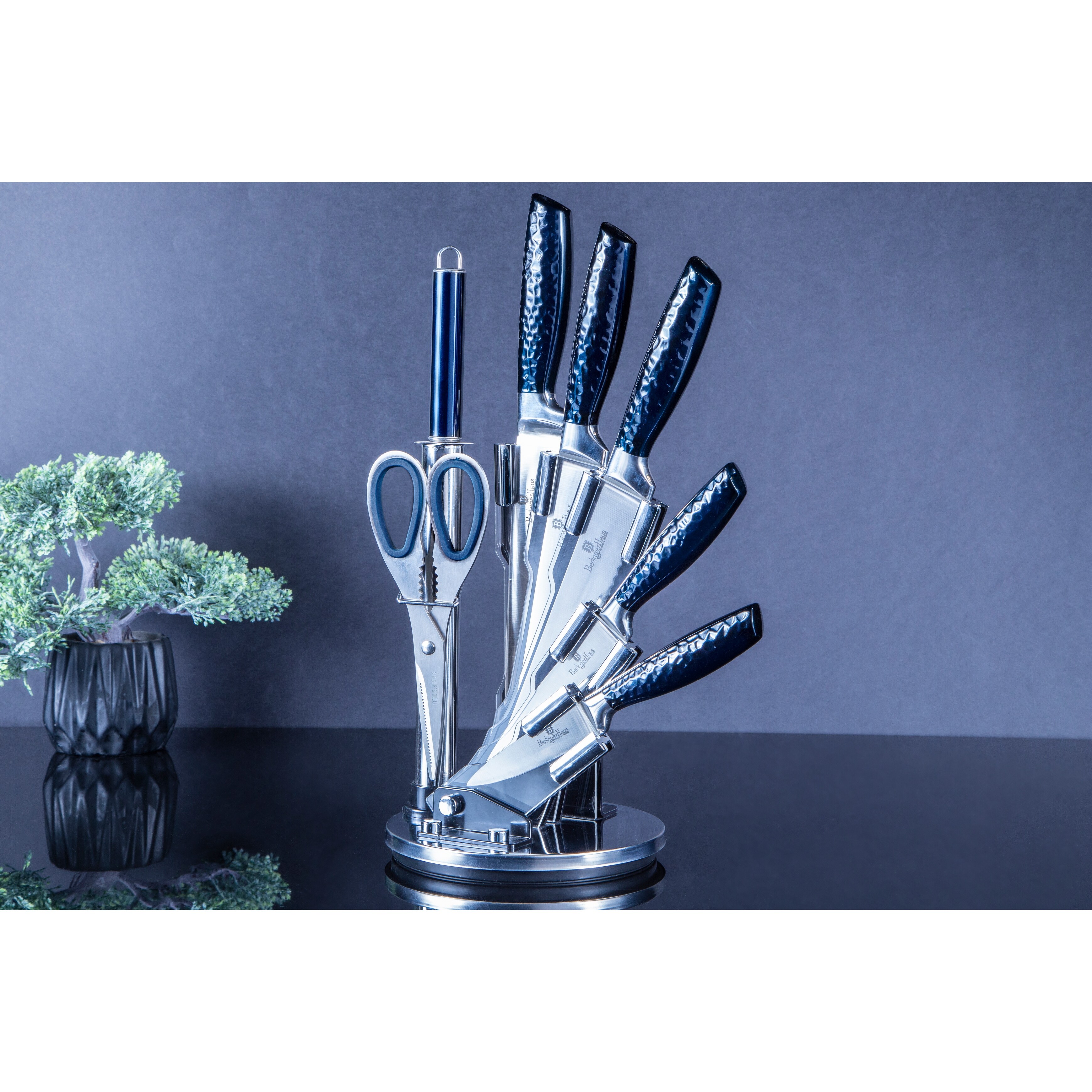 https://ak1.ostkcdn.com/images/products/is/images/direct/24beb41067708f93c60cadbda65ae52a79580c89/Berlinger-Haus-8-Piece-Knife-Set-with-Acrylic-Stand%2C-Aquamarine-Collection.jpg